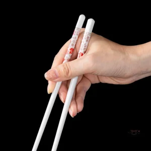 Baguettes blanches fleuries pour la vaisselle japonaise