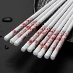Baguettes japonaises avec motif floral élégant et délicat