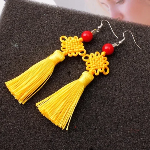 Boucle d'oreille noeud japonais en soie tressée