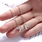 Boucle d'oreille artisanale grue origami japonaise