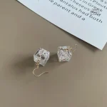 Boucle d'oreille originale avec design de jeux de cartes