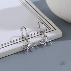 Création artisanale de boucle d'oreille nœud papillon