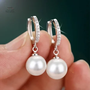 Boucle d'oreille perle japonaise élégante et raffinée