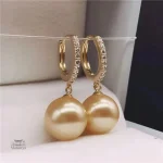 Création artisanale : boucle d'oreille perle