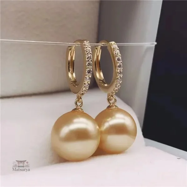 Création artisanale : boucle d'oreille perle