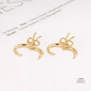 Boucles d'oreilles élégantes nœud doré