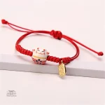 Accessoire mode avec motif de chat