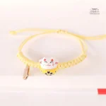 Bracelet décoré d'un chat stylisé