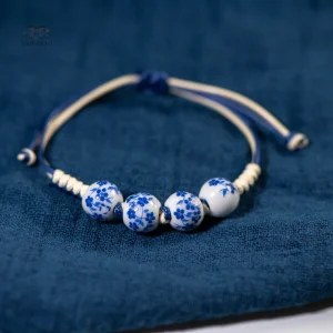 Bijou artisanal japonais en céramique et cordon