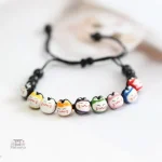 Bracelet coloré avec symbole de chance japonais