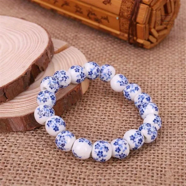 bracelet-japonais-perles-ceramique-a-fleur-1 Bracelet Japonais Perles Céramique