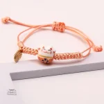 Bracelet traditionnel japonais symbolisant la chance
