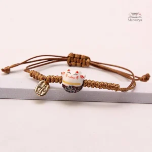 Accessoire de mode japonais offrant protection et bonheur