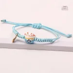 Bracelet japonais aux couleurs vives et motifs porte-bonheur