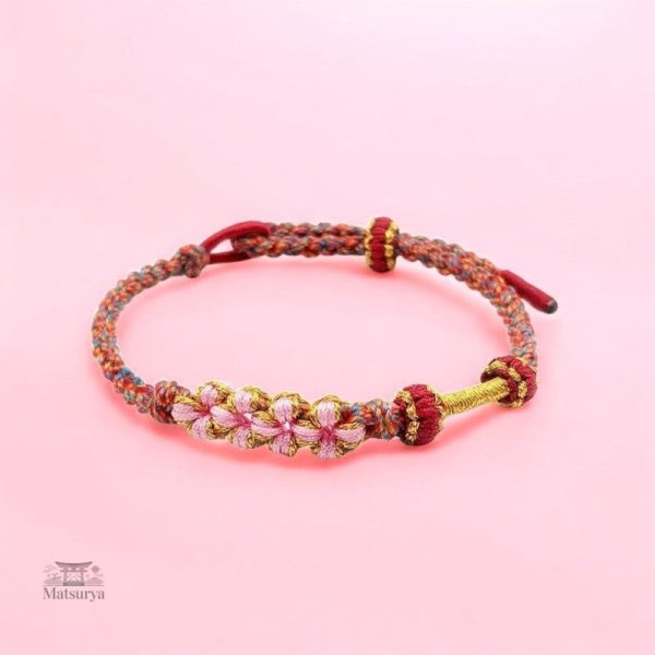Bracelet artisanal en tressage japonais avec fleurs