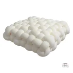 Coussin douillet en version tressée pour salon