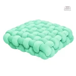 Coussin tressé, parfait pour vos moments de relaxation
