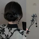 Pompon papillon, épingle à cheveux pour un look raffiné