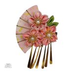 Épingle à cheveux stylisée avec design floral