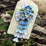Épingle à cheveux en tissu avec motifs floraux élégants