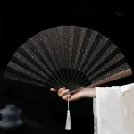 Éventail artisanal japonais, motif feuilles d'or