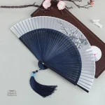 Éventail pliable en tissu