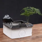 Fontaine japonaise artisanale en bois et pierre décorative