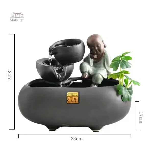 Détail de la fontaine Bouddha avec éléments zen japonais