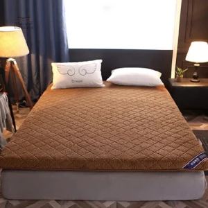 Futon compact enroulable pour un rangement facile
