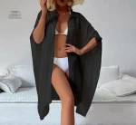 Kimono de plage uni à porter sur un maillot de bain