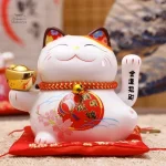 Statue de chat porte-bonheur à patte levée