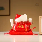 Figurine japonaise Maneki Neko, symbole de chance
