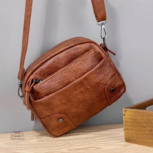 Sac à bandoulière en cuir compact