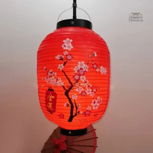 Petite lanterne japonaise rouge avec fleurs de cerisier