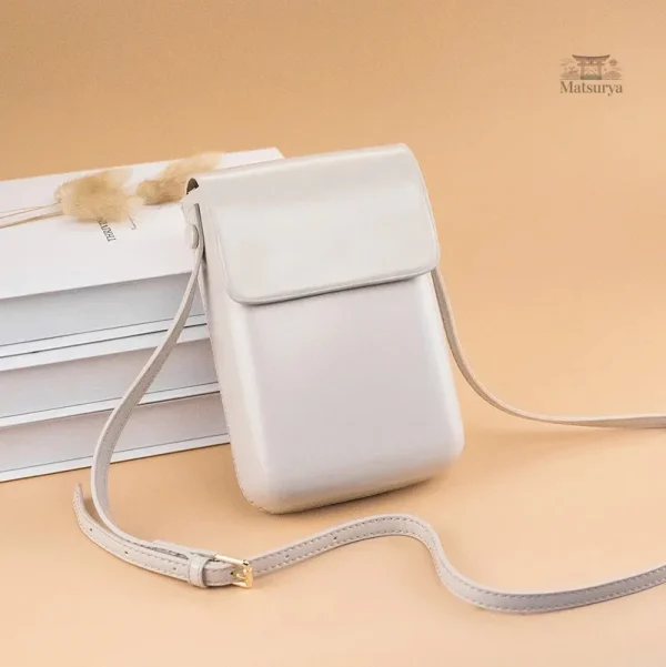 Pochette en cuir japonais, idéale pour les téléphones