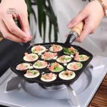 Ustensile de cuisine pour préparer des takoyaki croustillants