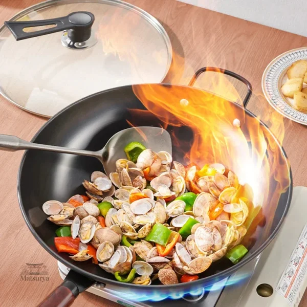 poele-wok-japonais-1 Poêle wok japonais en acier pour une cuisson authentique