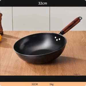 Wok en fonte pour un meilleur maintien de la chaleur
