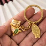 Porte-clef japonais représentant un chat souriant