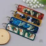 Porte-clef en forme de porte-bonheur japonais