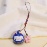 Porte-clés design japonais, chat mignon et éléments sakura