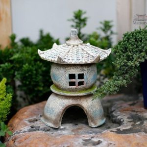 Statue japonaise en pierre, art extérieur zen