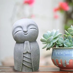 Statuette Jizo traditionnelle, symbole de protection et de bienveillance