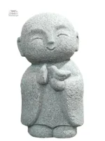 Détail d'une statue de moine japonais en méditation