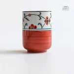 Tasse à thé élégante aux motifs nippons