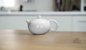 Théière blanche, accessoire essentiel pour amateurs de thé