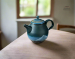 Théière en céramique décorée à la main