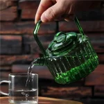 Théière japonaise verte transparente élégante