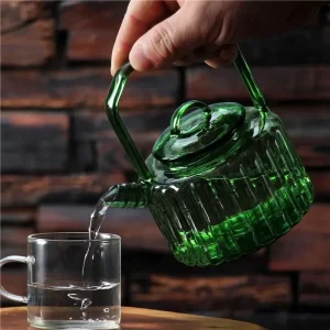 Théière japonaise verte transparente élégante